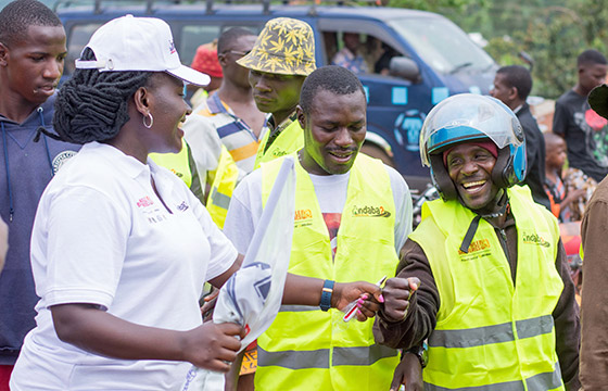 nbl-staff-sharing-a-moment-with-a-boda-boda-rider